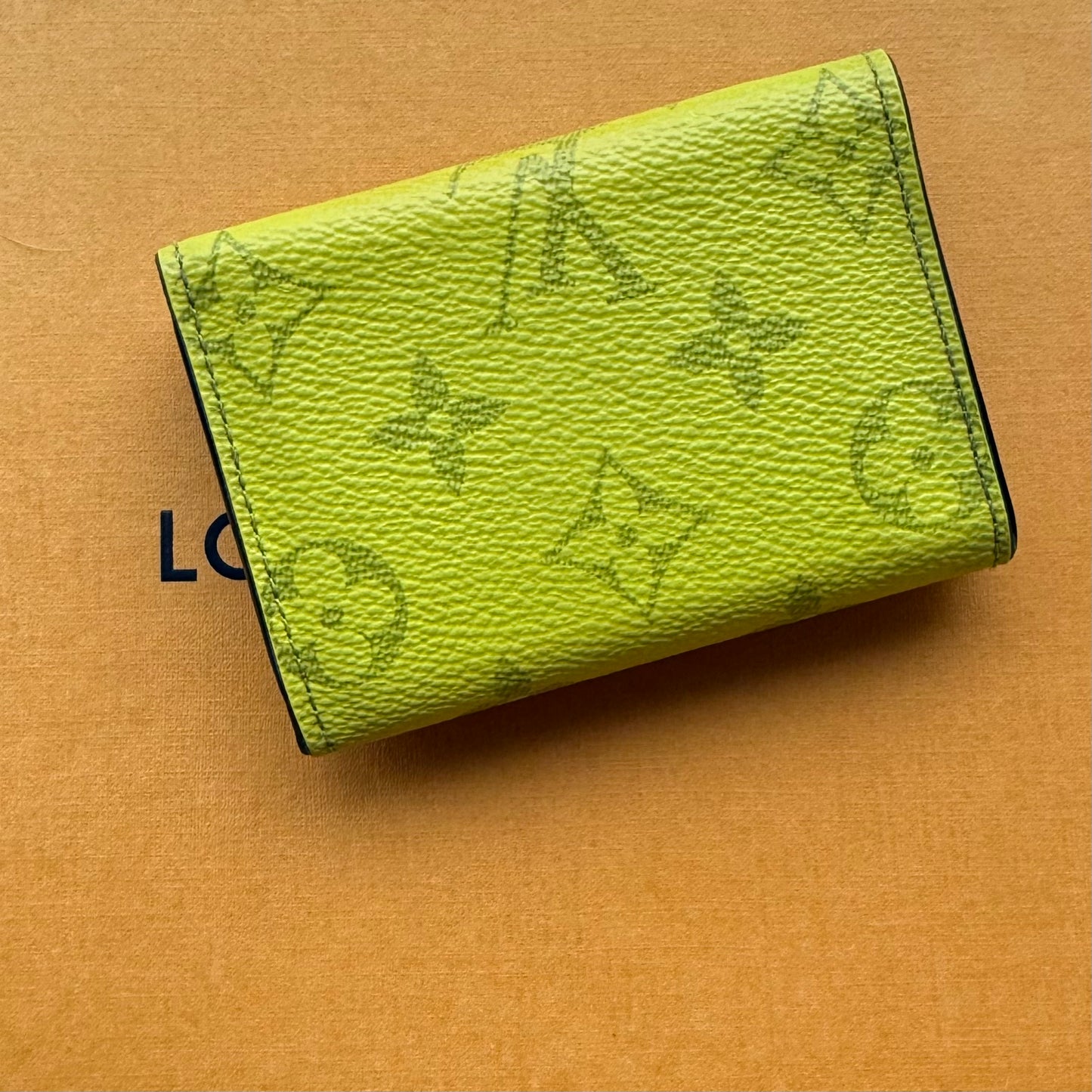 Authentic Preloved LV Discovery Compact Wallet in Monogram Bahia Taiga Yellow