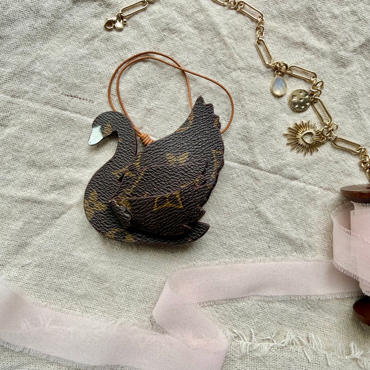 The SWAN Handmade Upcycled LV Oragami Bag Charm
