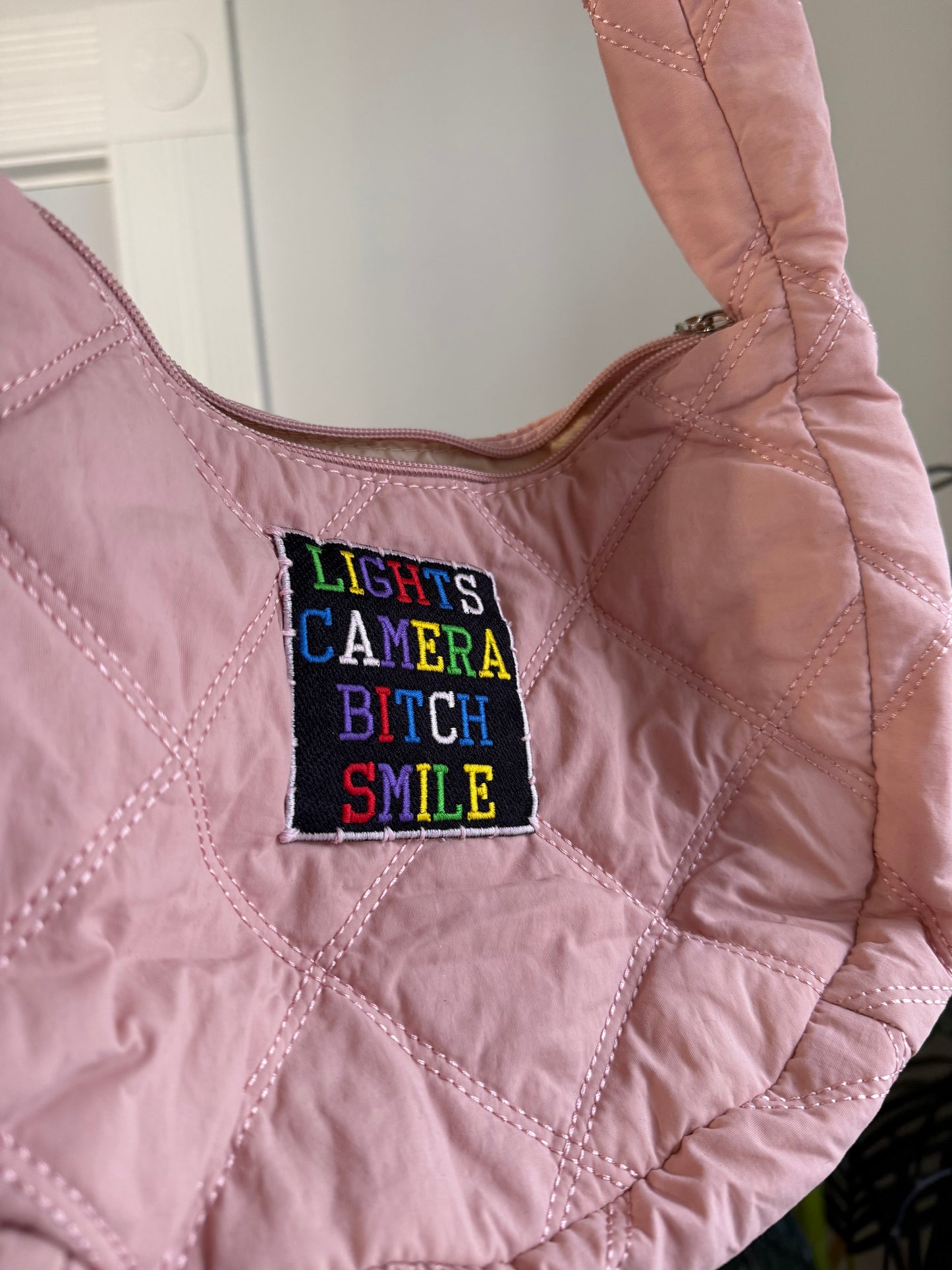 LIGHTS, CAMERA Puffer Bag