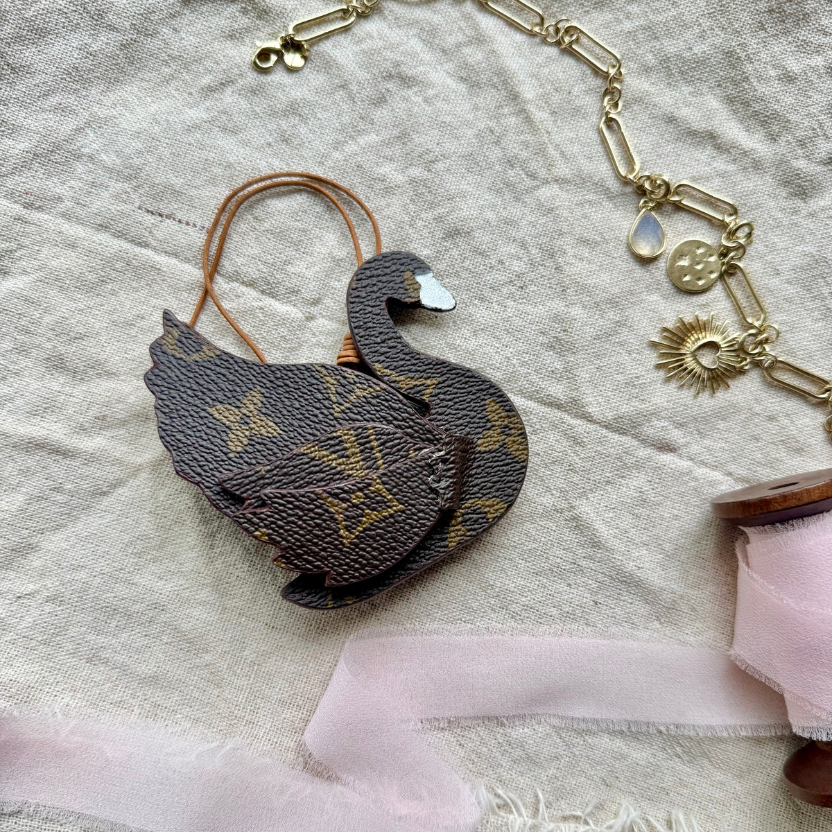 The SWAN Handmade Upcycled LV Oragami Bag Charm